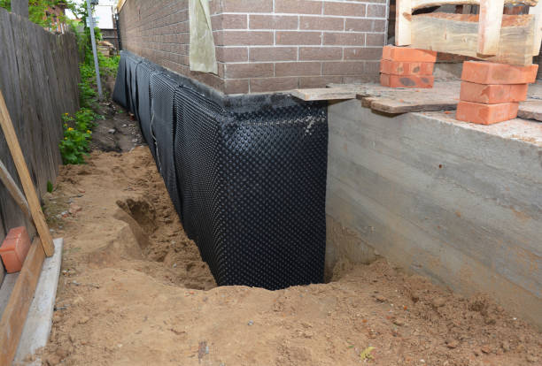 SJ Waterproofing Pros technician performing targeted Waterproofing assessment in Bainbridge, PA